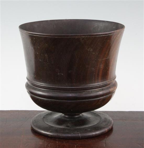 A late 17th century lignum vitae wassail cup, 7.25in., repaired